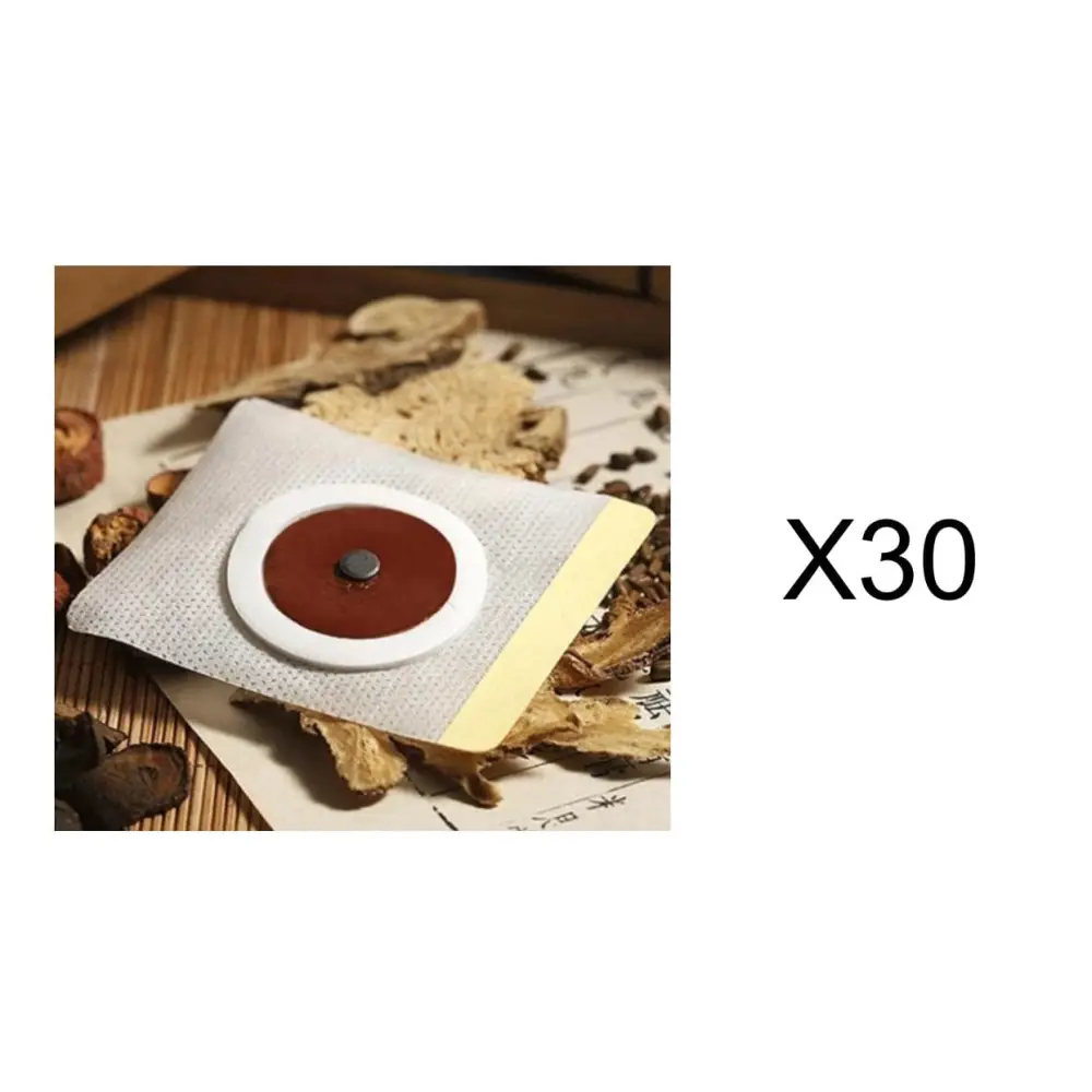 White mesh-backed magnetic slimming belly button patch with brown center and metallic disc on yellow adhesive strip