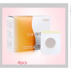 A white and orange box of magnetic slimming belly button patch with a single circular mesh button patch displayed beside it