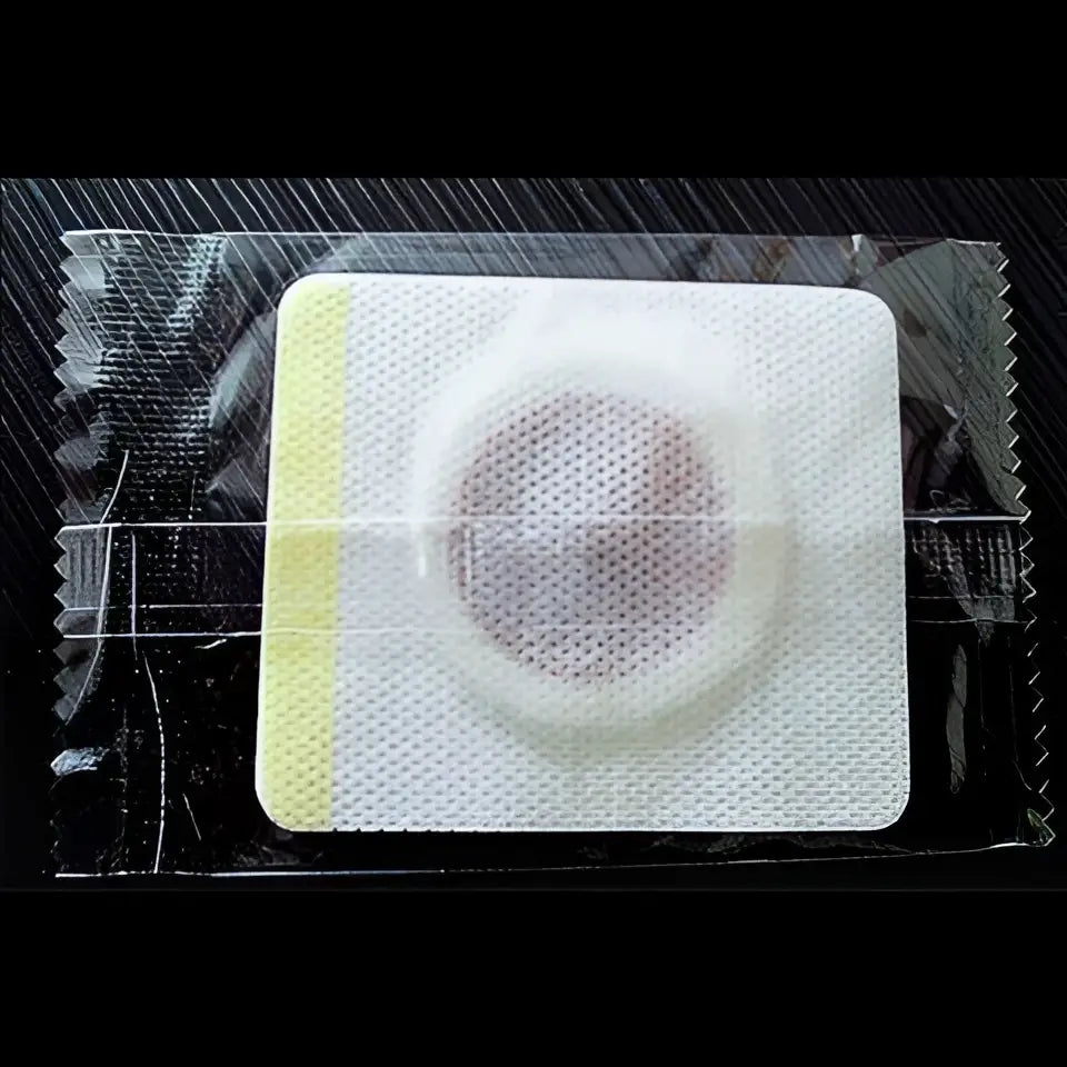 White square magnetic slimming belly button patch with circular textured center and yellow border for button patch slimming