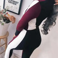Maroon white dual-shade athleisure set featuring a fitted long-sleeved color-blocked sportswear top