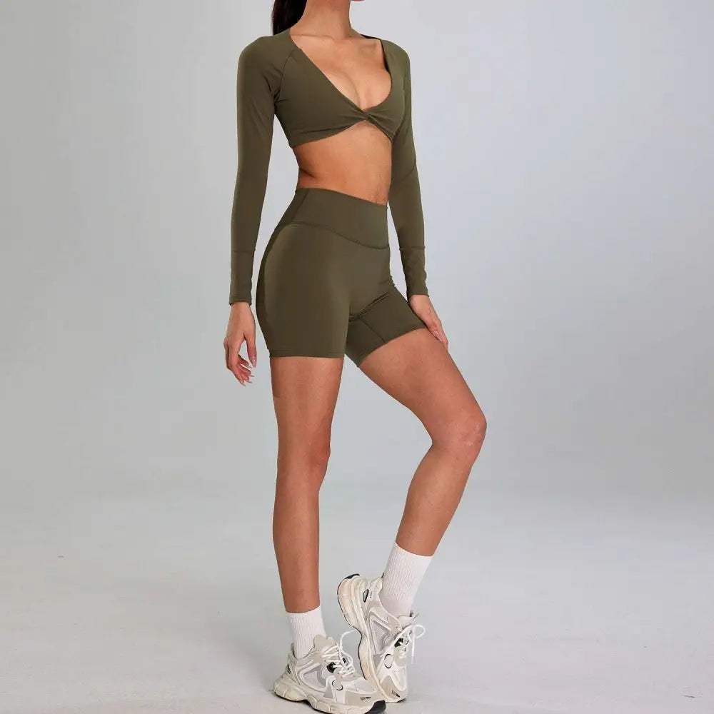 Olive green long-sleeved twisted front crop top with matching high waist shorts sports suit outdoor running nude set