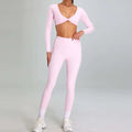 A soft pink form-fitting high waist suit two-piece sports suit outdoor running nude set with long sleeves and leggings