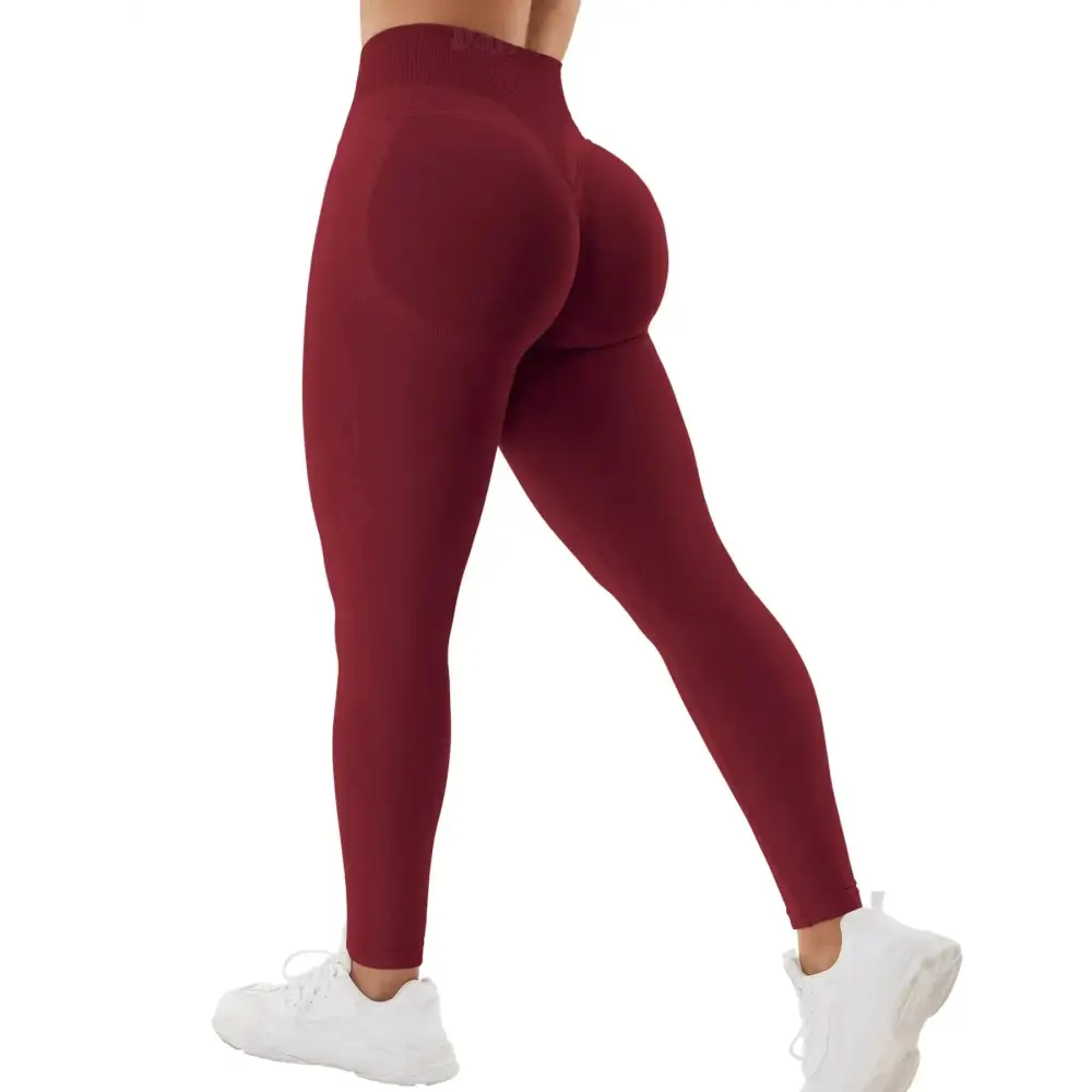 Maroon high waisted seamless impact leggings with a form-fitting butt lifting design for enhanced support