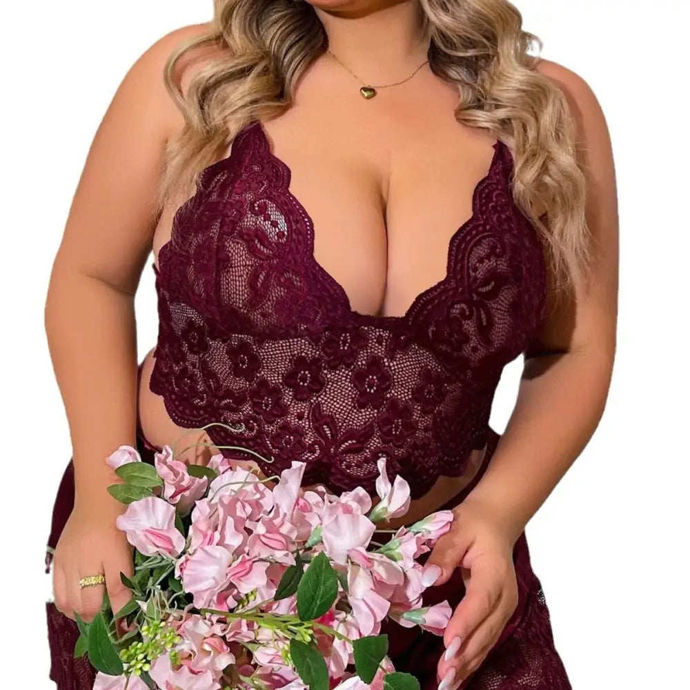 A maroon lace strap plus size two-piece suit featuring a floral lace bra with thin straps and matching satin pajama pants
