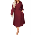 A maroon long sleeve v neck wrap midi dress with a cinched waist and pockets in a soft fabric