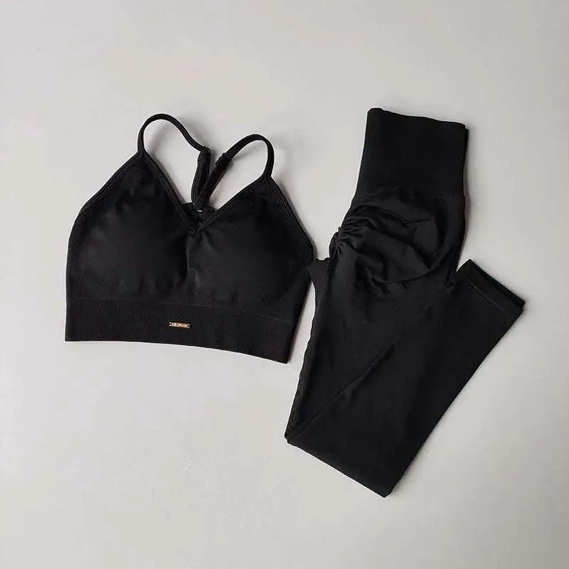 Black sports high waist tight seamless two-piece set with cropped crisscross sports bra and ruched leggings