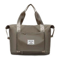 Gray fabric maroon wet separation sports travel bag with reinforced handles and a label designed branded patch on front