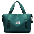 Teal green nylon travel duffel bag with reinforced handles and a label designed for maroon wet separation sports use