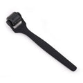 Matte black microneedle roller with a sleek oil rubber handle and cylindrical head featuring multiple fine needles