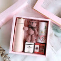 Matte pink vacuum flask with gold-toned lid in a corporate gift box ideal for aromatherapy tablets storage