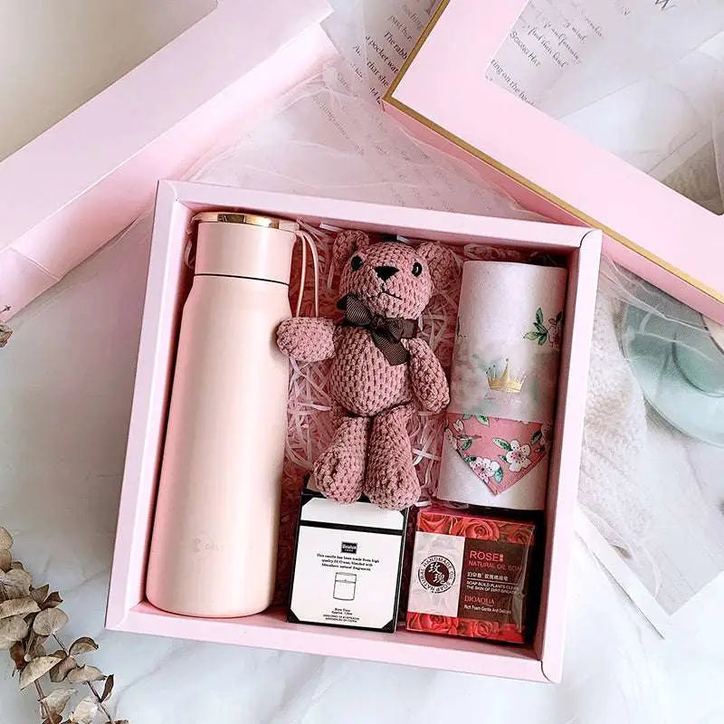 Matte pink vacuum flask with gold-toned lid in a corporate gift box ideal for aromatherapy tablets storage