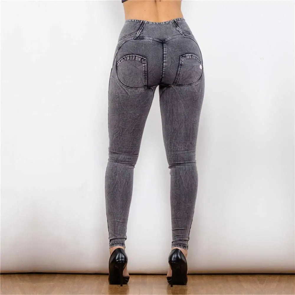 Back view of melody high waist gray denim leggings featuring form-fitting design and functional back pockets