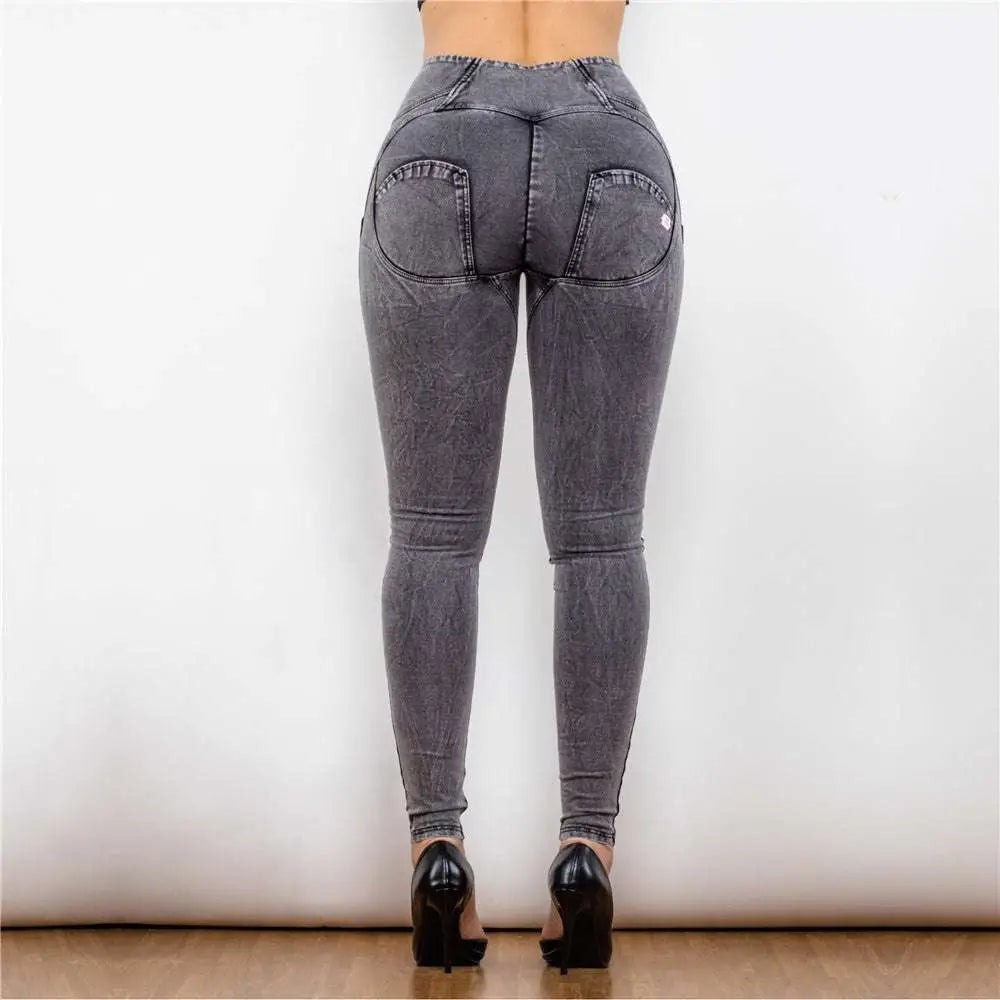 Back view of melody high waist gray denim leggings with fitted design and prominent back pockets by shascullfites melody high