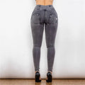 Image of the back side of melody high waist gray denim leggings with fitted design and two back pockets
