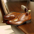 Men black leather shoes rubber sole brogues with polished finish and decorative perforations in brown leather