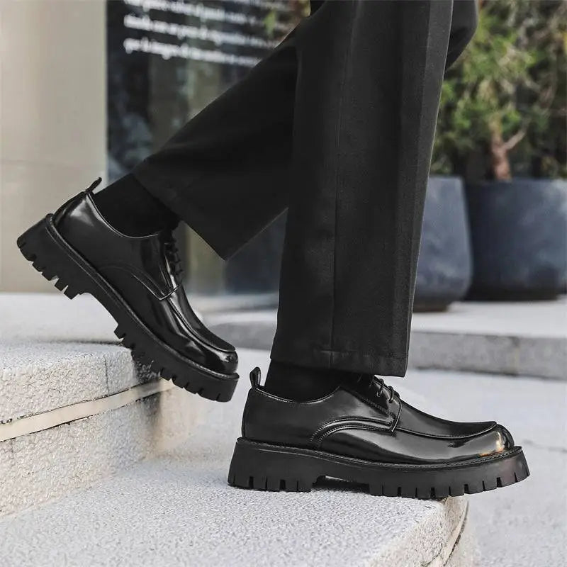 Black patent leather men’s casual lace-up oxford shoes with glossy finish red stitching and chunky textured sole