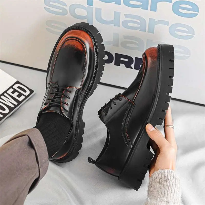 Men’s casual black leather shoes with red stitching, chunky rubber sole, and subtle reddish-brown toe cap accents