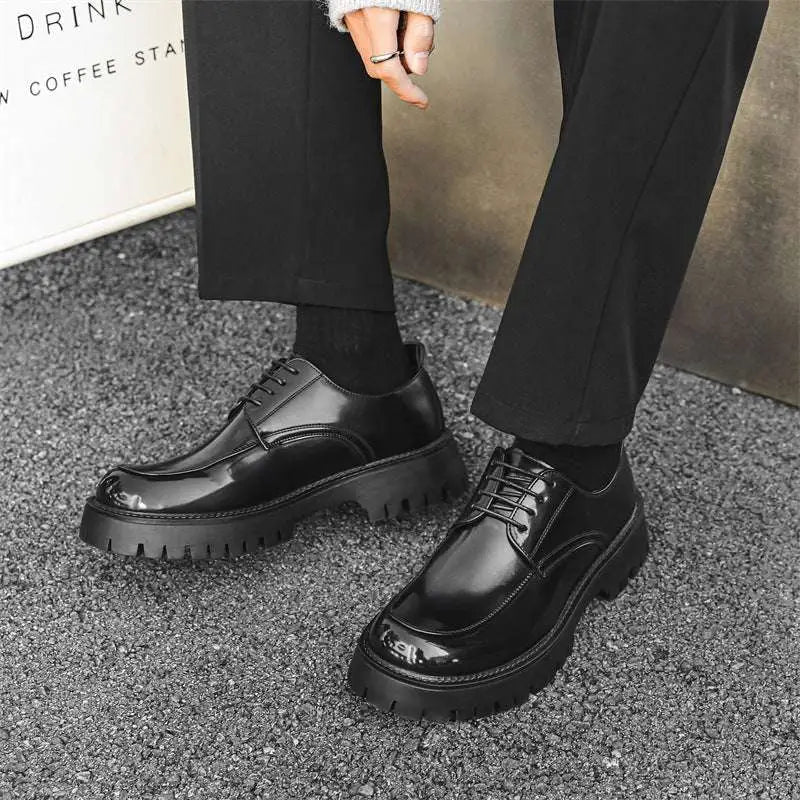 Black patent leather men’s casual lace-up oxford shoes with glossy finish red stitching and thick rugged soles