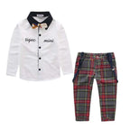 Men’s plaid suspenders treasure suit tide suit with white long-sleeved shirt and red gray plaid pants featuring navy suspenders