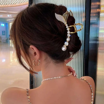 Mermaid gold shark clip featuring gold-toned metal, sparkling rhinestones, and white pearls for korean elegant temperament