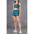 Teal two-piece athletic set with breathable fabric featuring mesh pockets fitness crop top and high-waisted shorts