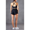 Black two-piece athletic set with mesh pockets fitness breathable crop top with crisscross back straps and shorts