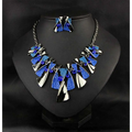 Blue and silver metal geometric shape rhinestone necklace set with textured layered pieces and small blue bead accents