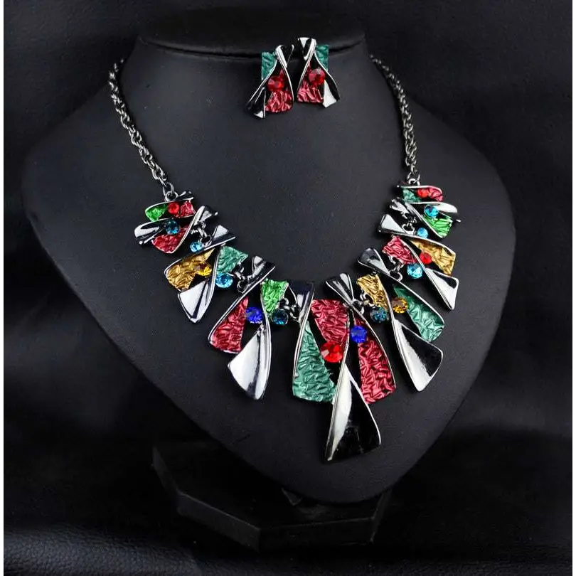Vibrant metal geometric shape necklace set with multicolored enamel and rhinestone accents featuring choker design