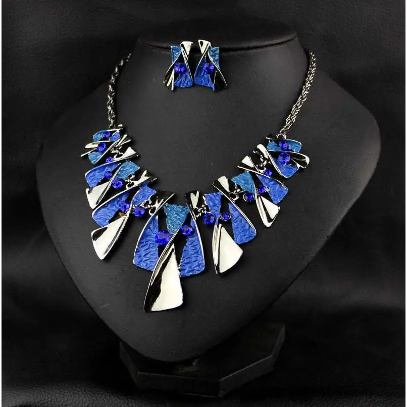 Metal geometric shape rhinestone earring necklace set with vibrant enamel accents and silver-toned chains necklace set
