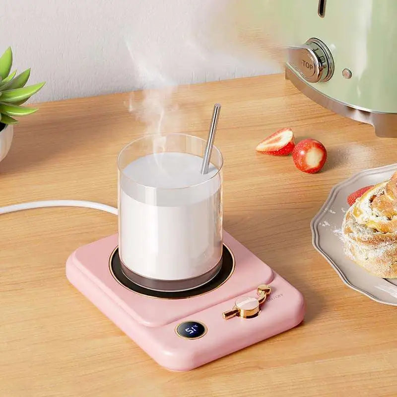 Pink electric milk heating insulation base desktop digital cup warmer with gold temperature control knob and display at 51°c