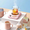 Pink electric milk heating insulation base desktop digital mug warmer with gold-tone control knob and digital display