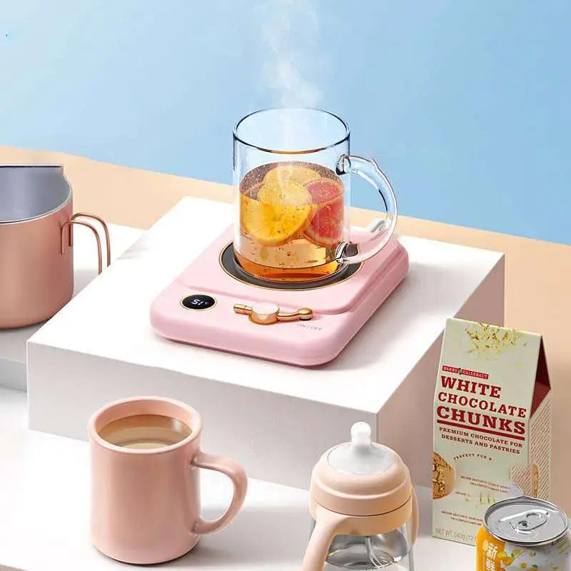 Pink electric milk heating insulation base desktop digital mug warmer with gold-tone control knob and digital display