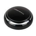 Black circular mini desktop robot vacuum cleaner with silver accent rings and clean robot branding for efficient cleaning