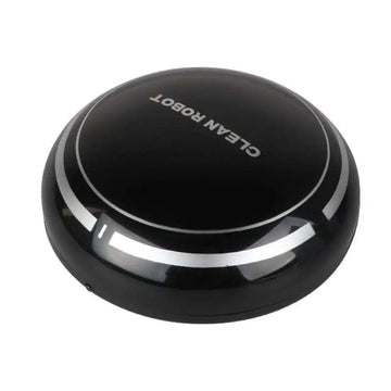 Black circular mini desktop robot vacuum cleaner with silver accent rings and clean robot branding for efficient cleaning
