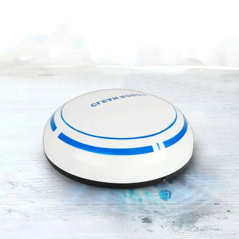 White and blue circular mini desktop robot vacuum with sleek modern design for efficient desktop cleaning