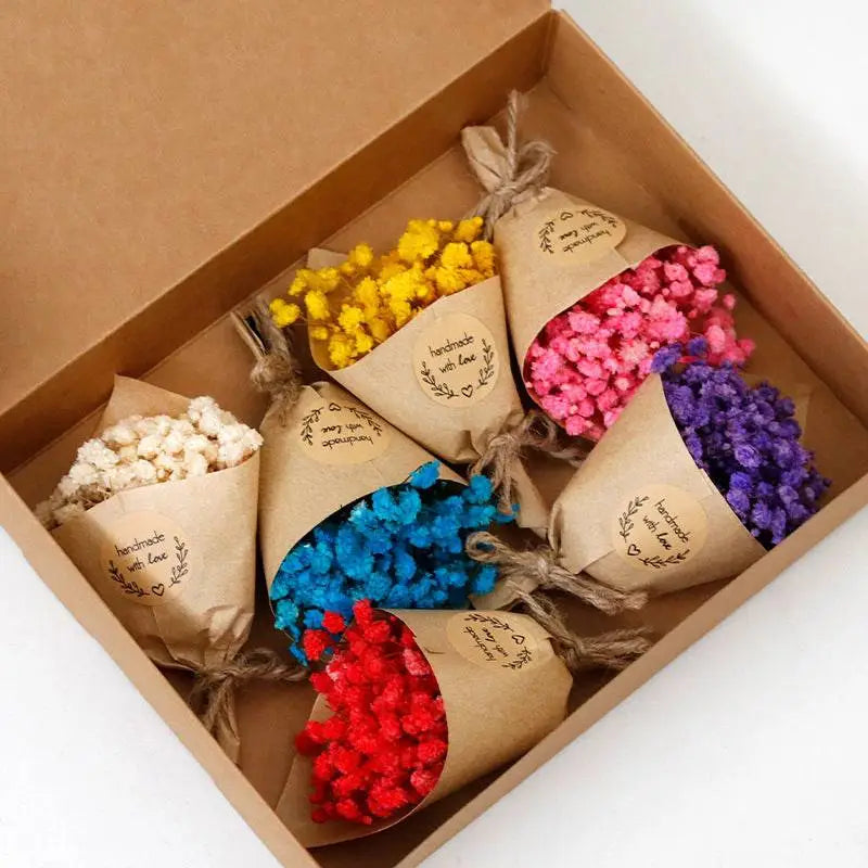 A mini dried flower bouquet gift box featuring colorful bouquets wrapped in brown kraft paper for home decoration