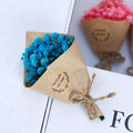 Mini dried flower bouquet gift box featuring a vibrant blue dried flower bouquet wrapped in rustic kraft paper for home decoration