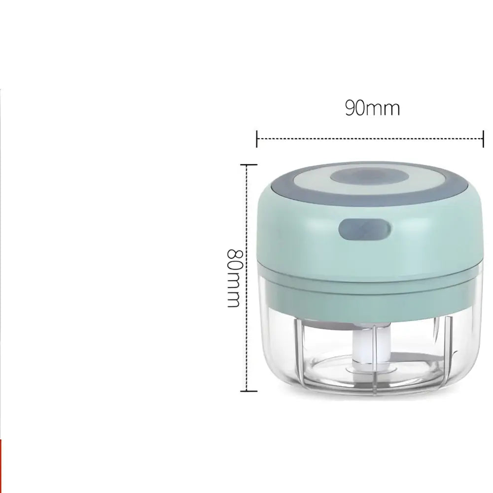 A compact mint-green mini electric garlic chopper with stainless steel blade and clear glass bowl for efficient chopping