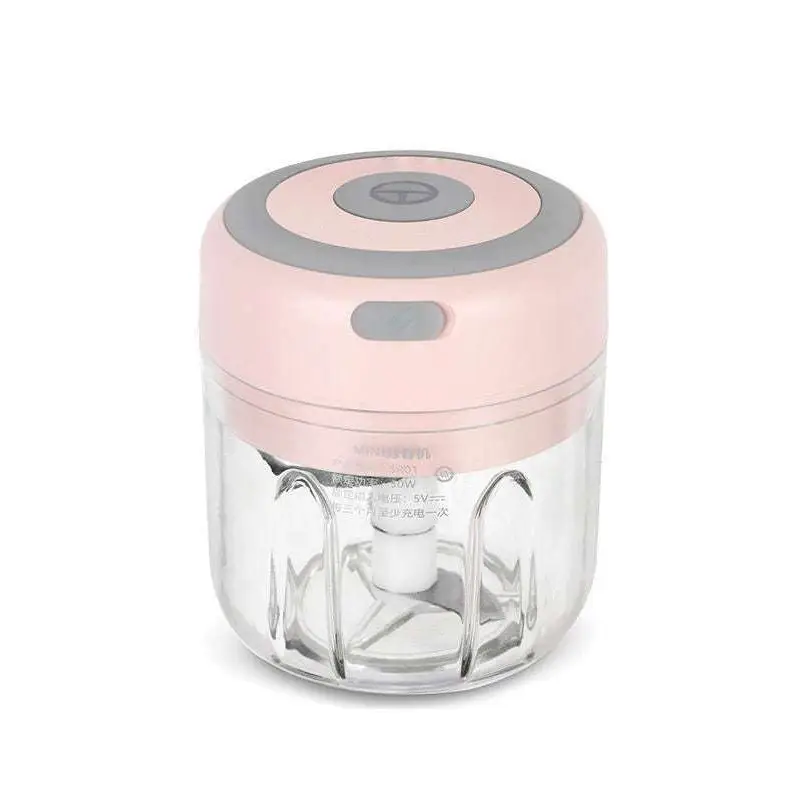 Pink and gray mini electric garlic chopper with clear glass bowl and stainless steel blade for efficient food chopping