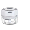 Compact white and gray mini electric garlic chopper with stainless steel blade and clear glass bowl for efficient food chopping