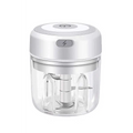 White and transparent mini electric garlic chopper with glass bowl and stainless steel blade inside clear container