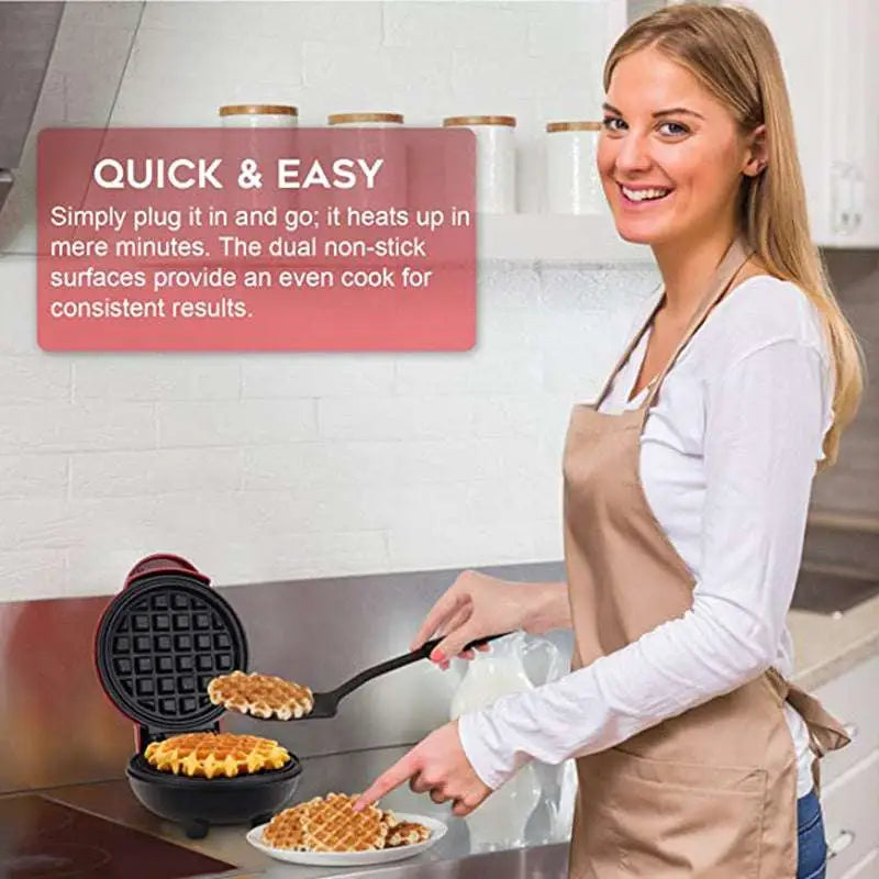 Mini electric waffle maker in red and black with dual non-stick cooking surfaces for easy waffle preparation