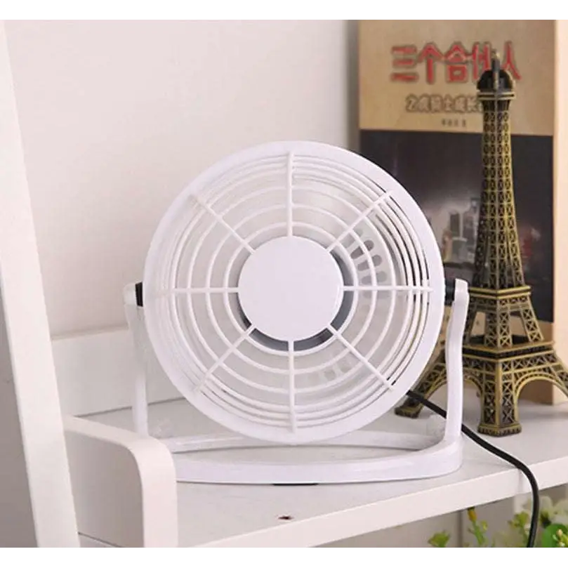White plastic mini portable usb fan cooler with circular grille and stand for desktop and cooling laptop use