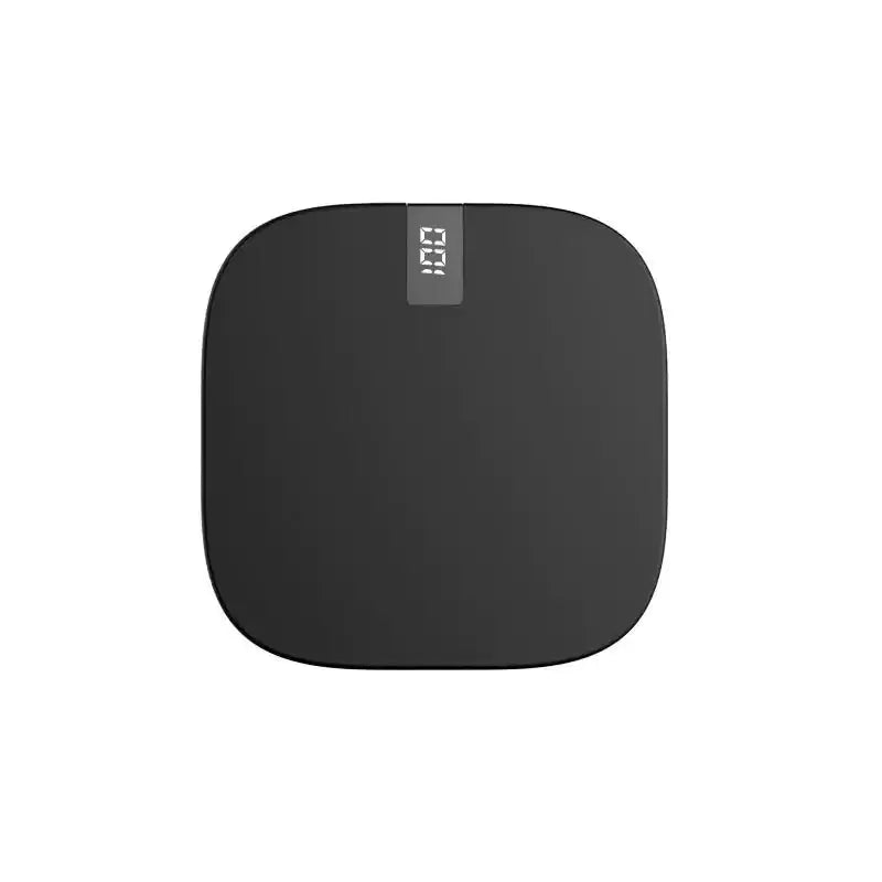 Black mini power bank 10000mah with digital scale slim design and rounded corners displaying 0.0 on screen