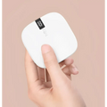 White square-shaped mini power bank 10000mah with digital scale slim design and black display showing 0.2