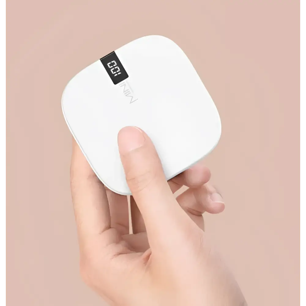 White square-shaped mini power bank 10000mah with digital scale slim design and black display showing 0.2