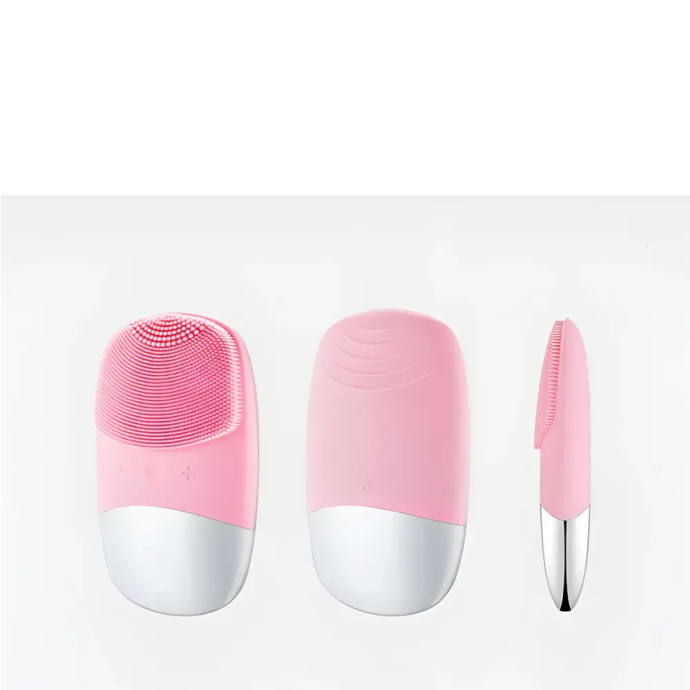 Mini silicone electric facial cleanser brush with pink and white soft silicone bristles for gentle skin cleansing