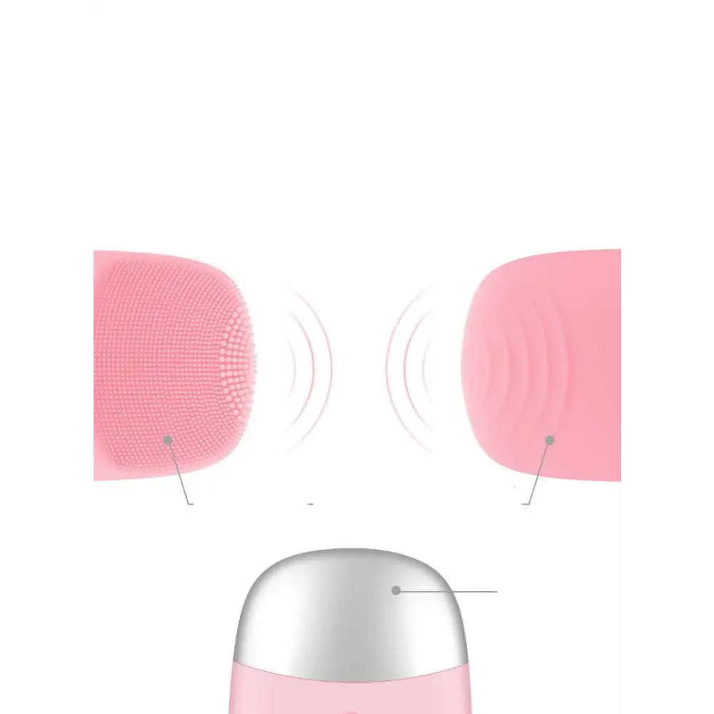 Pink mini silicone electric facial cleanser brush with soft silicone bristles and a silver metallic base