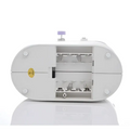 White oval miniature household multifunctional sewing machine with hinged lid and internal compartments for springs and parts