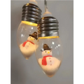 Clear glass miniature scene christmas led string lights featuring snowman figurines with brown hats and red scarves